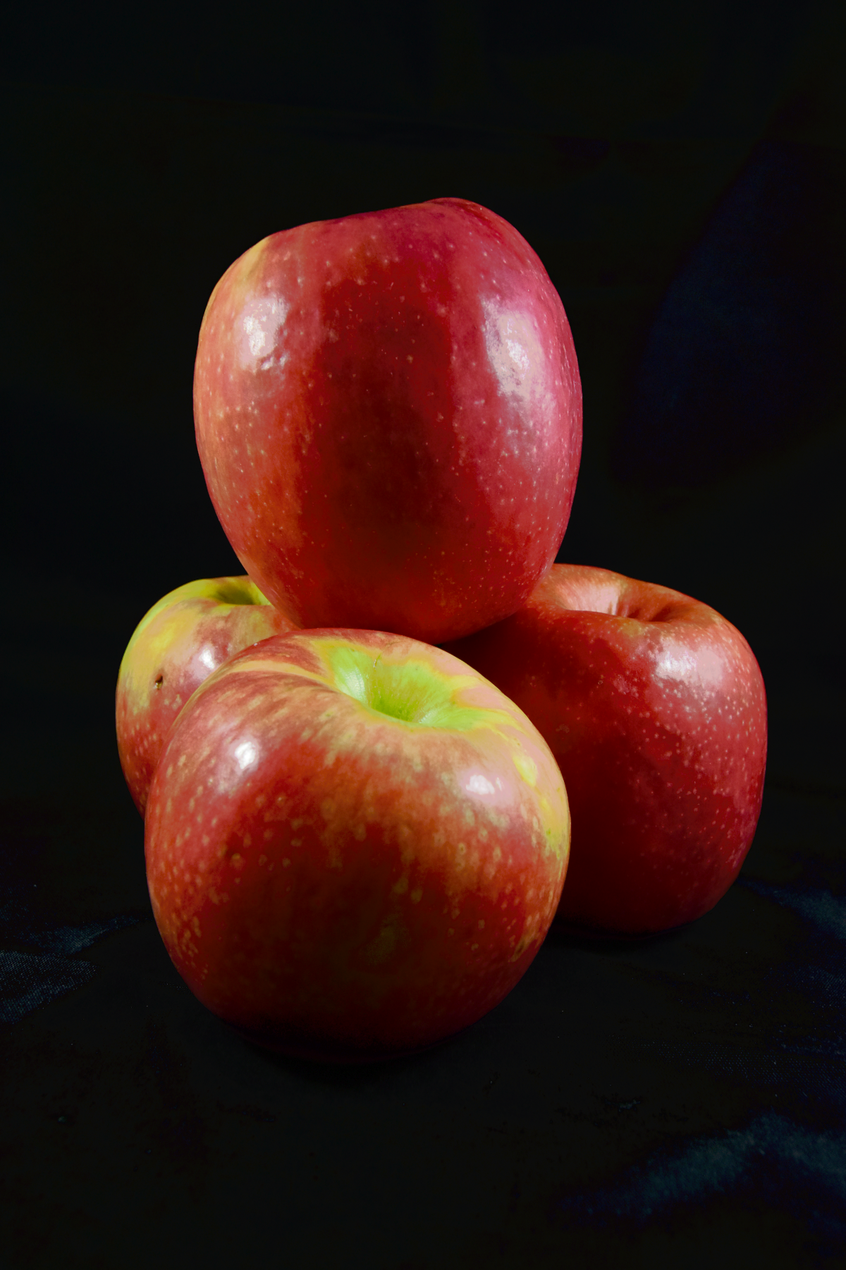 A small stack of red apples.